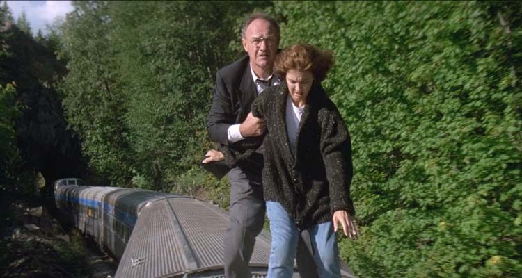 Narrow Margin 1990 Movie Scene Gene Hackman as Robert Caulfield and Anne Archer as Carol on top of the train trying to run from the bad guys