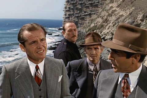 Chinatown 1974 Movie Scene Jack Nicholson as J.J. Gittes at coast waiting with detectives for the water to start flowing
