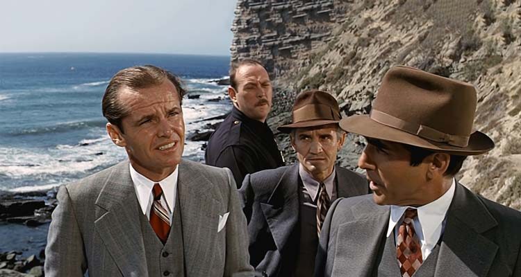 Chinatown 1974 Movie Scene Jack Nicholson as J.J. Gittes at coast waiting with detectives for the water to start flowing