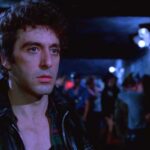 Cruising 1980 Movie Scene Al Pacino as Steve Burns wearing a leather jacket inside of a gay leather nightclub