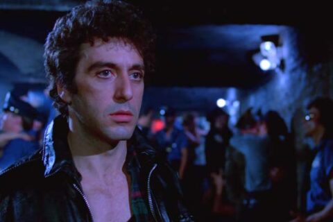 Cruising 1980 Movie Scene Al Pacino as Steve Burns wearing a leather jacket inside of a gay leather nightclub