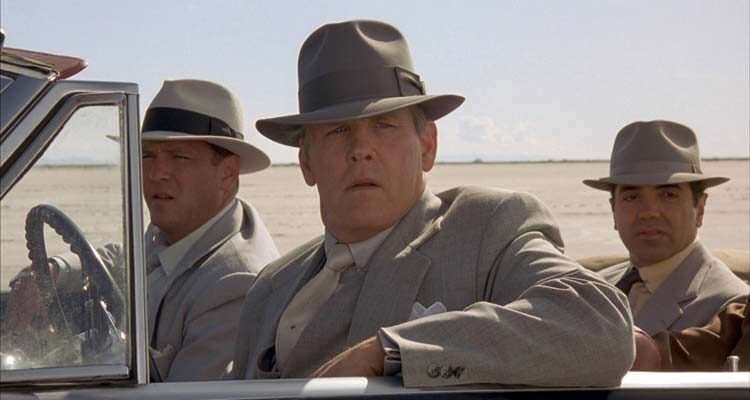 Mulholland Falls 1996 Movie Scene Nick Nolte as Max Hoover driving a car in the desert