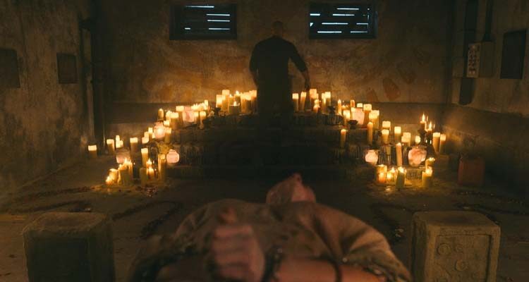 No One Gets Out Alive 2021 Movie Scene David Figlioli as Becker preparing the alter of sacrifice in the basement