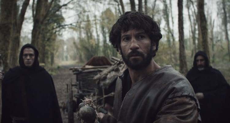 Pilgrimage 2017 Movie Scene Jon Bernthal as The Mute escorting a cart carrying the relic through the woods