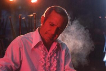 The Killing of a Chinese Bookie 1976 Movie Scene Ben Gazzara as Cosmo Vittelli smoking in his strip club