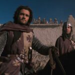 Kingdom of Heaven 2005 Movie Scene Orlando Bloom as Balian de Ibelin in full armor riding his horse outside Jerusalem