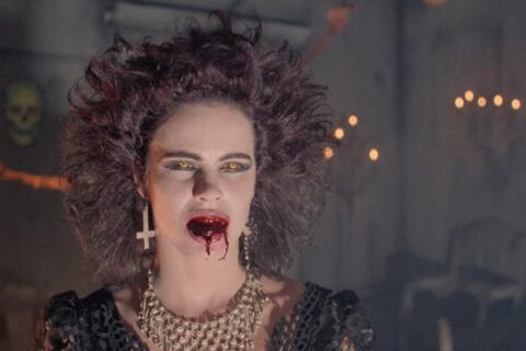 Night of the Demons 1988 Movie Scene Amelia Kinkade as Angela, the goth chick with blood in her mouth and demonic eyes,