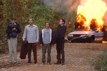 Road Trip 2000 Movie Scene Breckin Meyer as Josh, Seann William Scott as E. L., Paulo Costanzo as Rubin and DJ Qualls as Kyle with their broken car exploding in the background