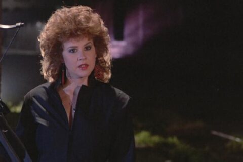 Savage Streets 1984 Movie Scene Linda Blair as Brenda holding a crossbow and exacting revenge