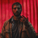 Upgrade 2018 Movie Scene Logan Marshall-Green as Grey Trace STEM tasting human blood after becoming self-aware during the finale