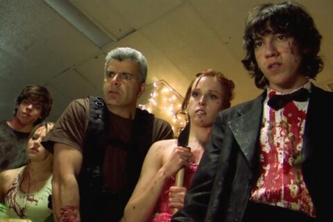 Dance of the Dead 2008 Movie Scene Jared Kusnitz as Jimmy, Greyson Chadwick as Lindsey, and Mark Oliver as Coach Keel realizing that prom is overrun with zombies