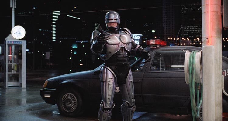 RoboCop 1987 Movie Scene Peter Weller as Alex Murphy exiting his car and holding a gun pointed at the bad guy