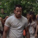 Anacondas The Hunt for the Blood Orchid 2004 Movie Scene Johnny Messner as Bill, KaDee Strickland as Sam and Karl Yune as Tran in the jungle looking at a giant snake