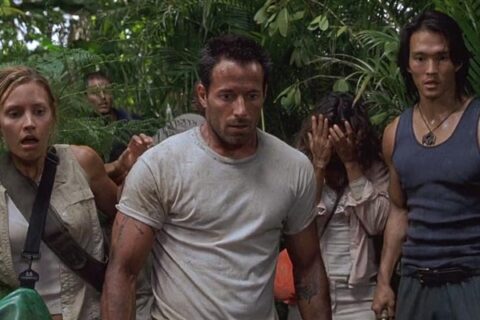 Anacondas The Hunt for the Blood Orchid 2004 Movie Scene Johnny Messner as Bill, KaDee Strickland as Sam and Karl Yune as Tran in the jungle looking at a giant snake