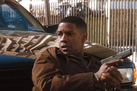 Fallen 1998 Movie Scene Denzel Washington as John Hobbes holding a gun and hiding from the demon Azazel who's been following him