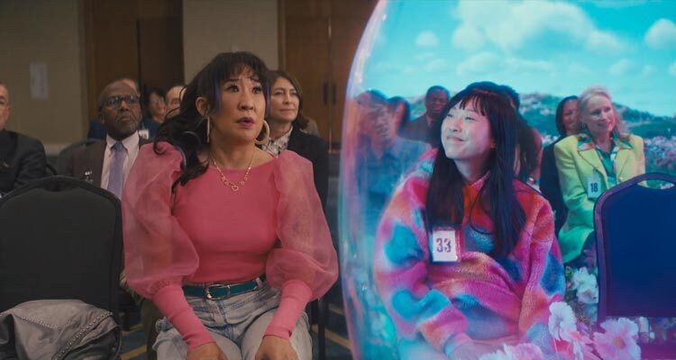 Quiz Lady 2023 Movie Scene Awkwafina as Anne Yum high on drugs while Sandra Oh as Jenny Yum is panicking