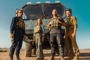 Le salaire de la peur AKA The Wages of Fear 2024 Remake Cast of the movie standing on front of the truck Franck Gastambide, Alban Lenoir, Ana Girardot, and Sofiane Zermani