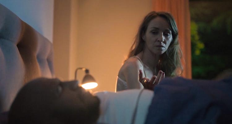 Loving Adults 2022 Movie Scene Sonja Richter as Leonora asking her husband Dar Salim as Christian to see his phone