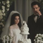 Priscilla 2023 Movie Scene Cailee Spaeny as Priscilla and Jacob Elordi as Elvis on their wedding day