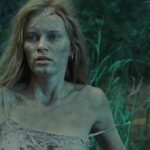 The Last House On The Left 2009 Movie Scene Sara Paxton as Mari running away from their attackers in the woods