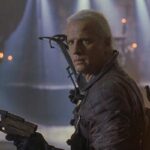 Beowulf 1999 Movie Scene Christopher Lambert as Beowulf holding double crossbows and looking for Grendel, the beast