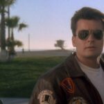 Hot Shots 1991 Movie Scene Charlie Sheen as Topper Harley wearing sun glasses and a leather jacket just like Tom Cruise in Top Gun