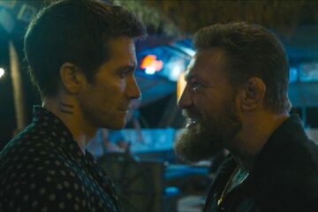 Road House 2024 Movie Scene Jake Gyllenhaal as Dalton and Conor McGregor as Knox squaring off in the bar