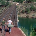 Stand by Me 1986 Movie Scene Four friends about the cross the train bridge not knowing that the train is right behind them