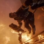 Backdraft 1991 Movie Scene Kurt Russell as Stephen McCaffrey holding Scott Glenn as John Adcox above the fiery pit