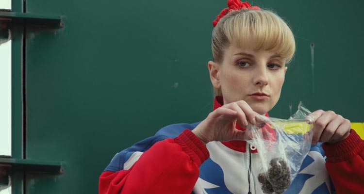 The Bronze 2015 Movie Scene Melissa Rauch as Hope Ann Greggory smelling the weed she just bought